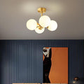 Stylish Mid-Century Modern 4-Light Gold Glass Globe Chandelier for Living Room