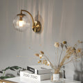Elegant Curved Arm Wall Sconce with Ribbed Glass Shade for Living Room