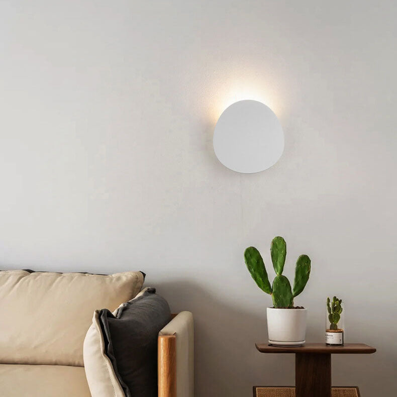 Sleek Black Round LED Wall Sconce for Indoor and Outdoor Use