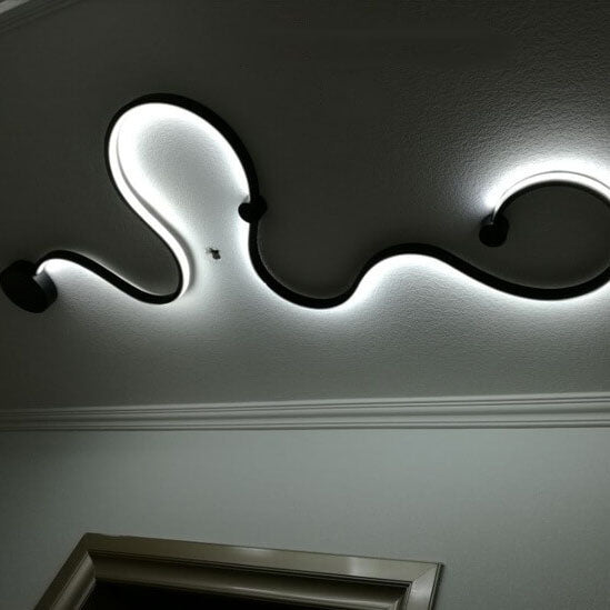 Sleek Silver Aluminum Snake Shaped LED Wall Sconce for Modern Decor