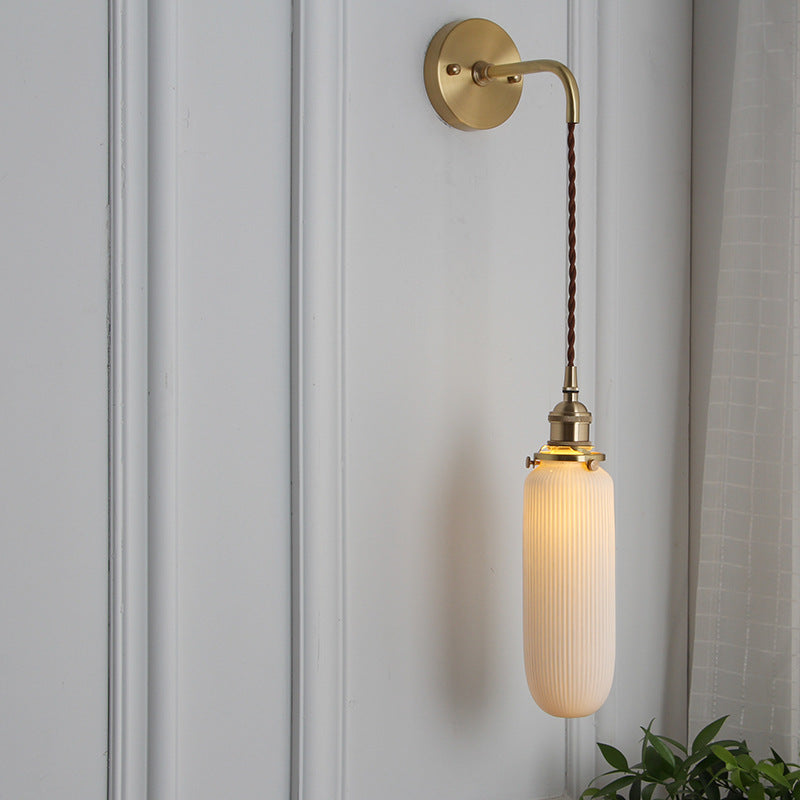 Retro Minimalist Brass and Lucite Oval Wall Sconce for Elegant Spaces