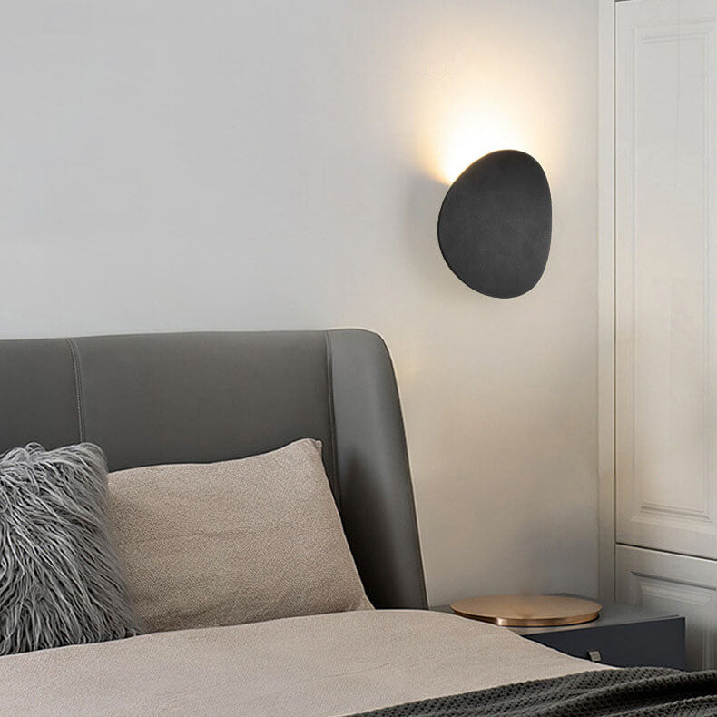 Sleek Black Round LED Wall Sconce for Indoor and Outdoor Use