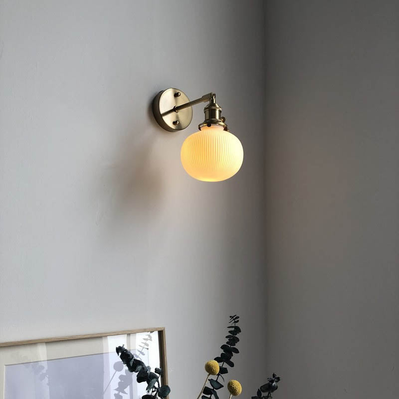 Retro Minimalist Brass and Lucite Oval Wall Sconce for Elegant Spaces