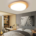 Modern White Acrylic Pebble Shape LED Flush Mount Light for Bedroom