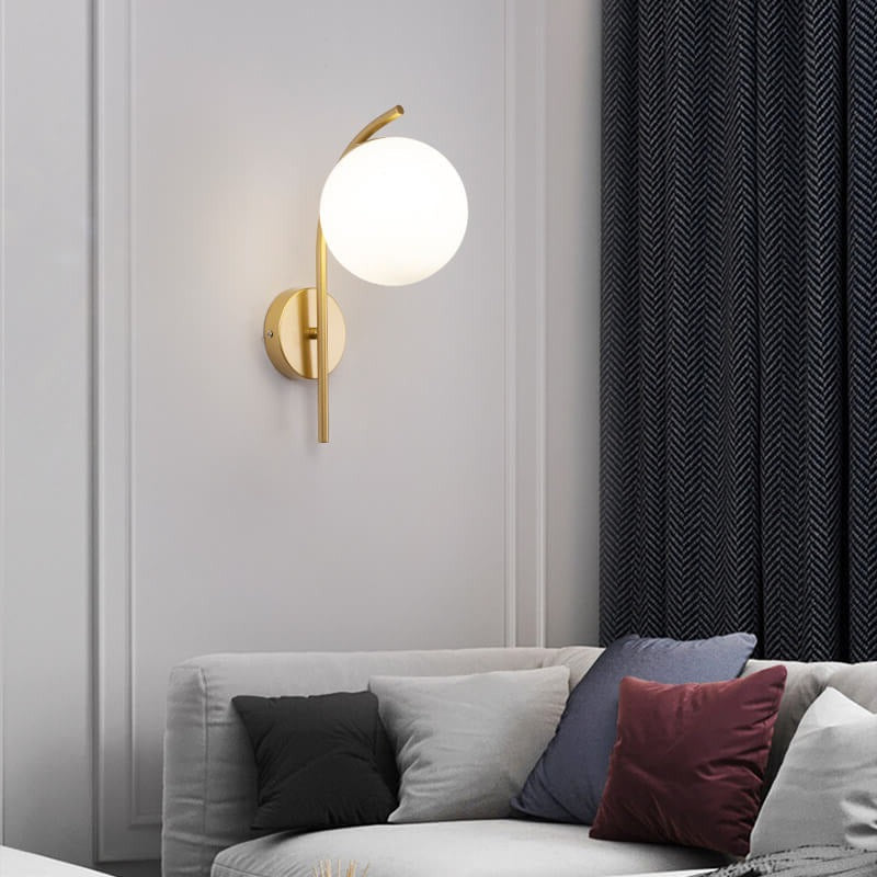 Nordic Arc Brass Glass Globe 1-Light Wall Sconce for Modern Interiors