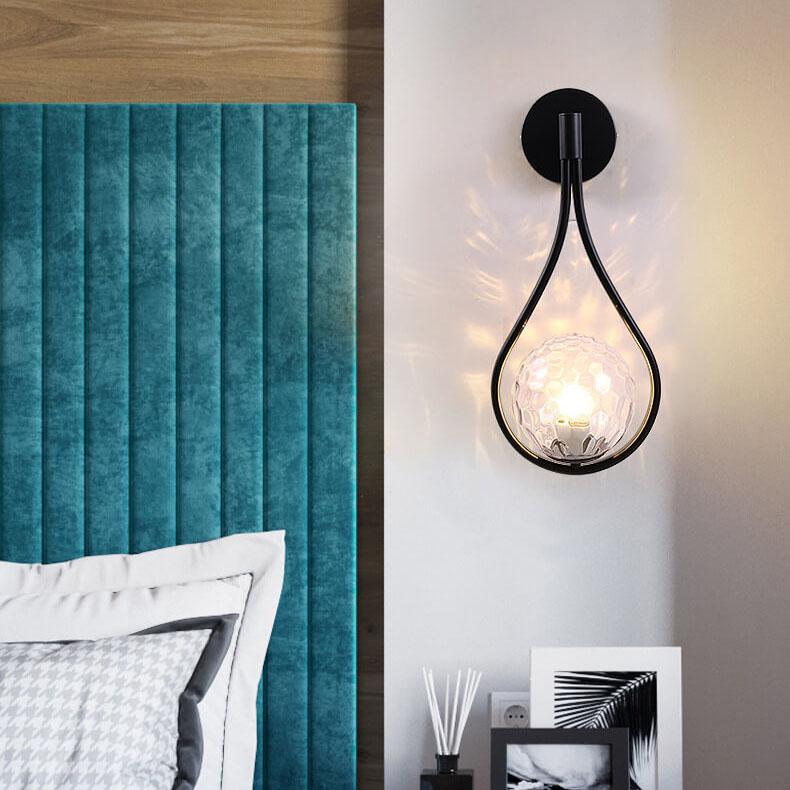 Sleek 1-Light Glass Globe Water Drop Wall Sconce for Modern Interiors