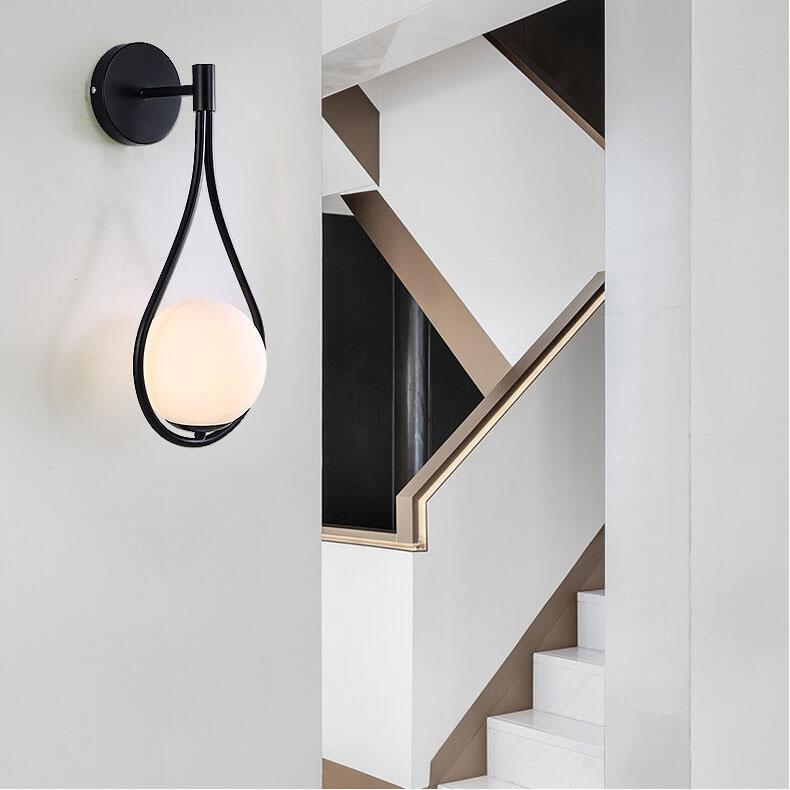 Sleek 1-Light Glass Globe Water Drop Wall Sconce for Modern Interiors