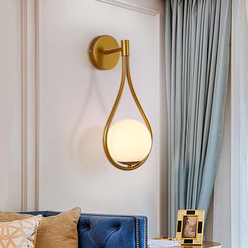 Sleek 1-Light Glass Globe Water Drop Wall Sconce for Modern Interiors