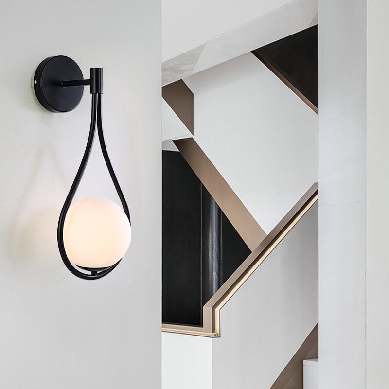 Sleek 1-Light Glass Globe Water Drop Wall Sconce for Modern Interiors