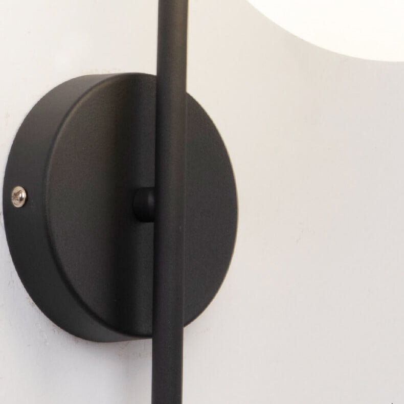 Nordic Arc Brass Glass Globe 1-Light Wall Sconce for Modern Interiors