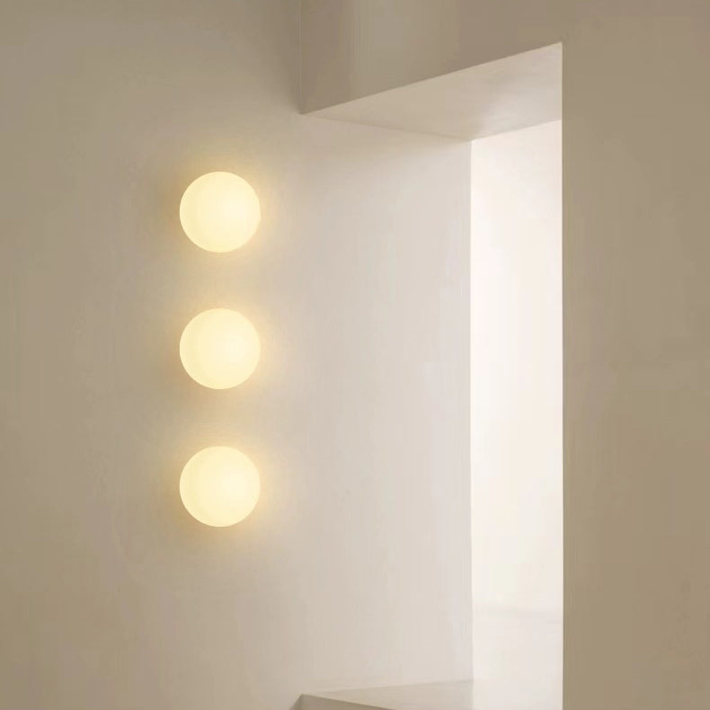 Contemporary Clear Glass Orb 1-Light Wall Sconce for Living Room Decor