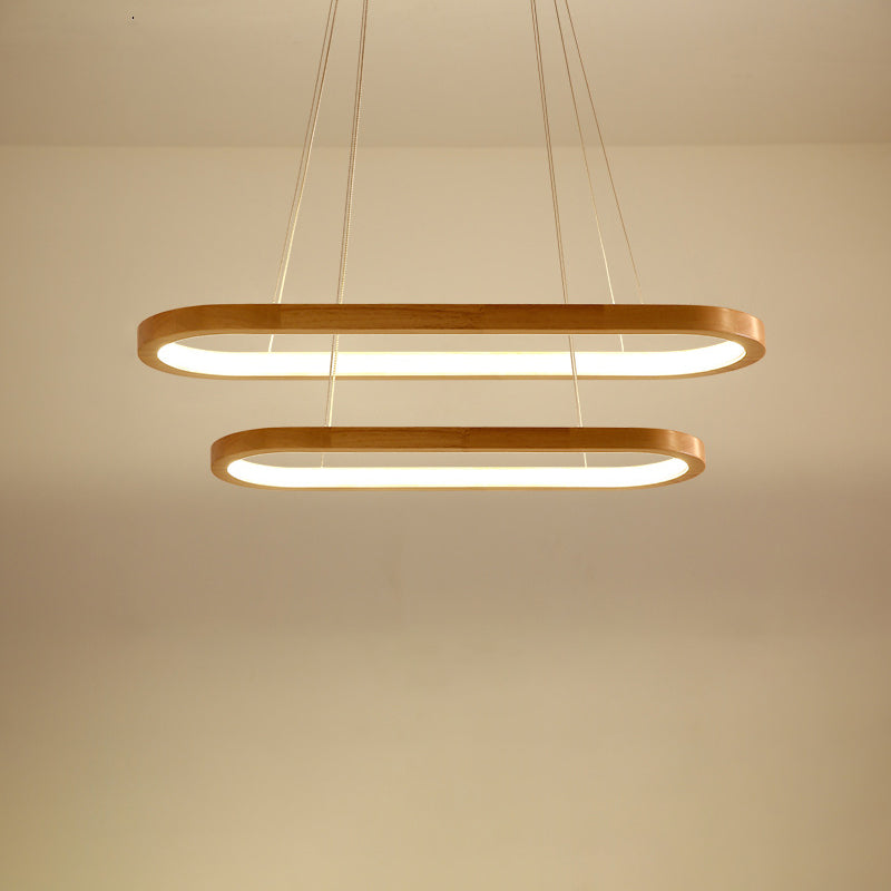 Sleek White Acrylic Oval LED Chandelier for Modern Living Room Decor