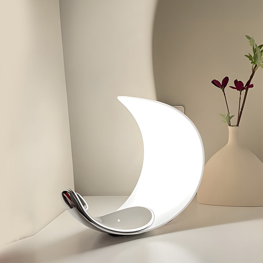 Sleek Curved Silver Chrome LED Table Lamp for Modern Living Room Decor