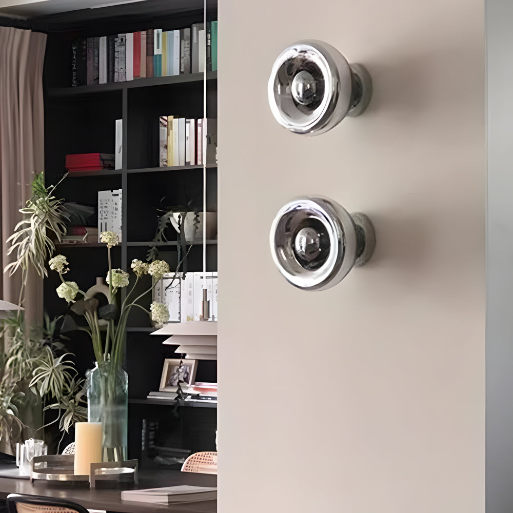 Luxury Chrome Round Wall Sconce with Lava Art Design for Modern Spaces