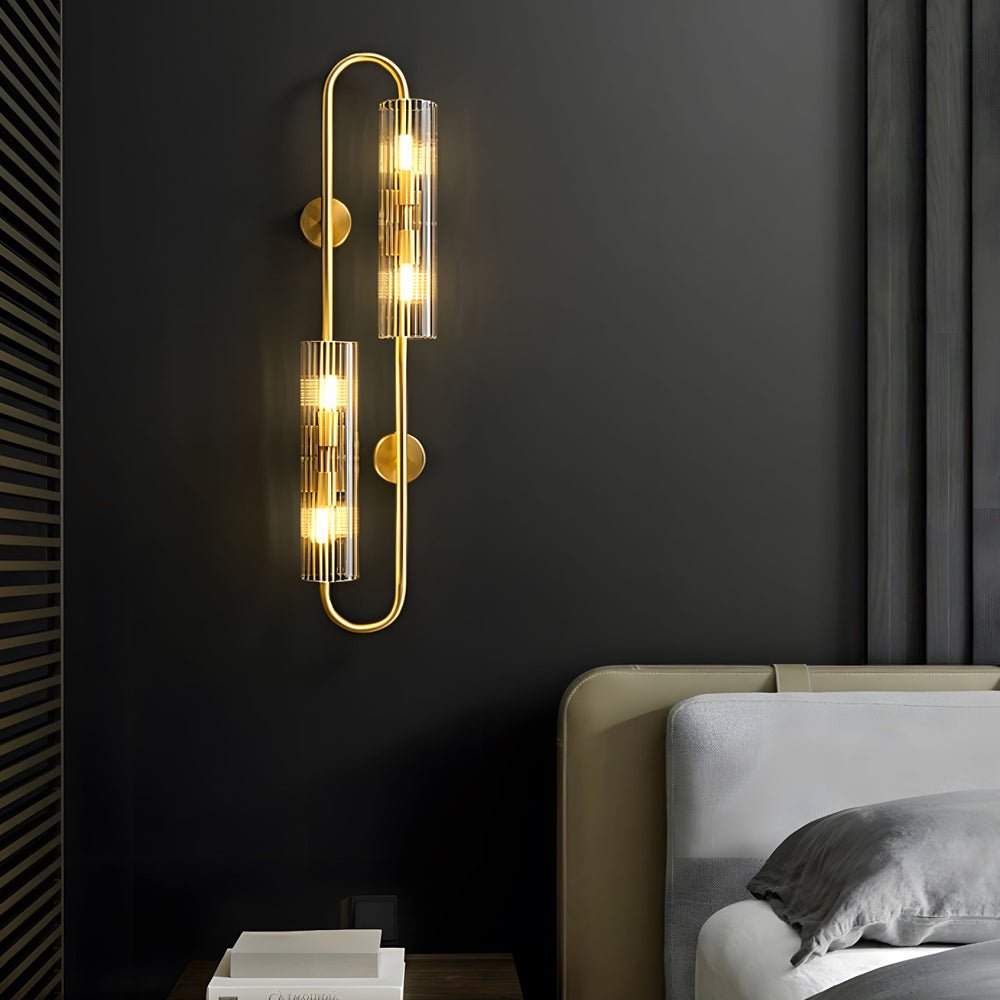 Elegant Brass 4-Light Wall Sconce with Clear Glass Shade for Modern Spaces