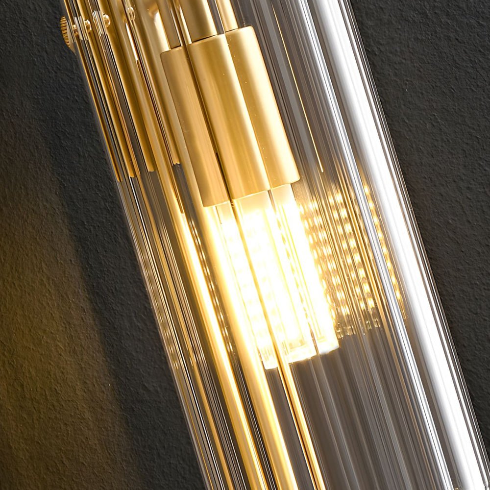 Elegant Brass 4-Light Wall Sconce with Clear Glass Shade for Modern Spaces