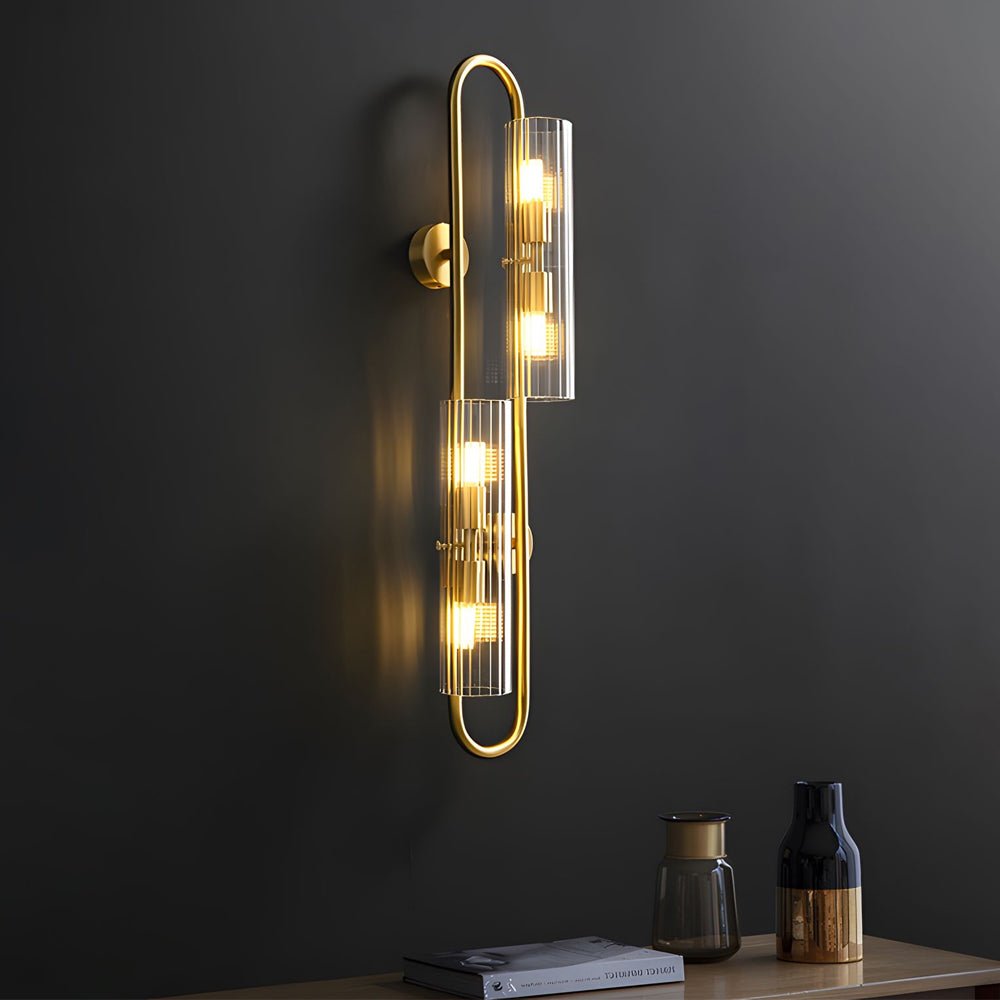 Elegant Brass 4-Light Wall Sconce with Clear Glass Shade for Modern Spaces