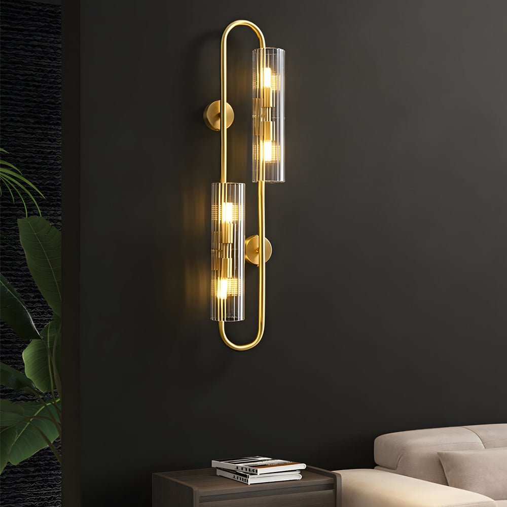 Elegant Brass 4-Light Wall Sconce with Clear Glass Shade for Modern Spaces