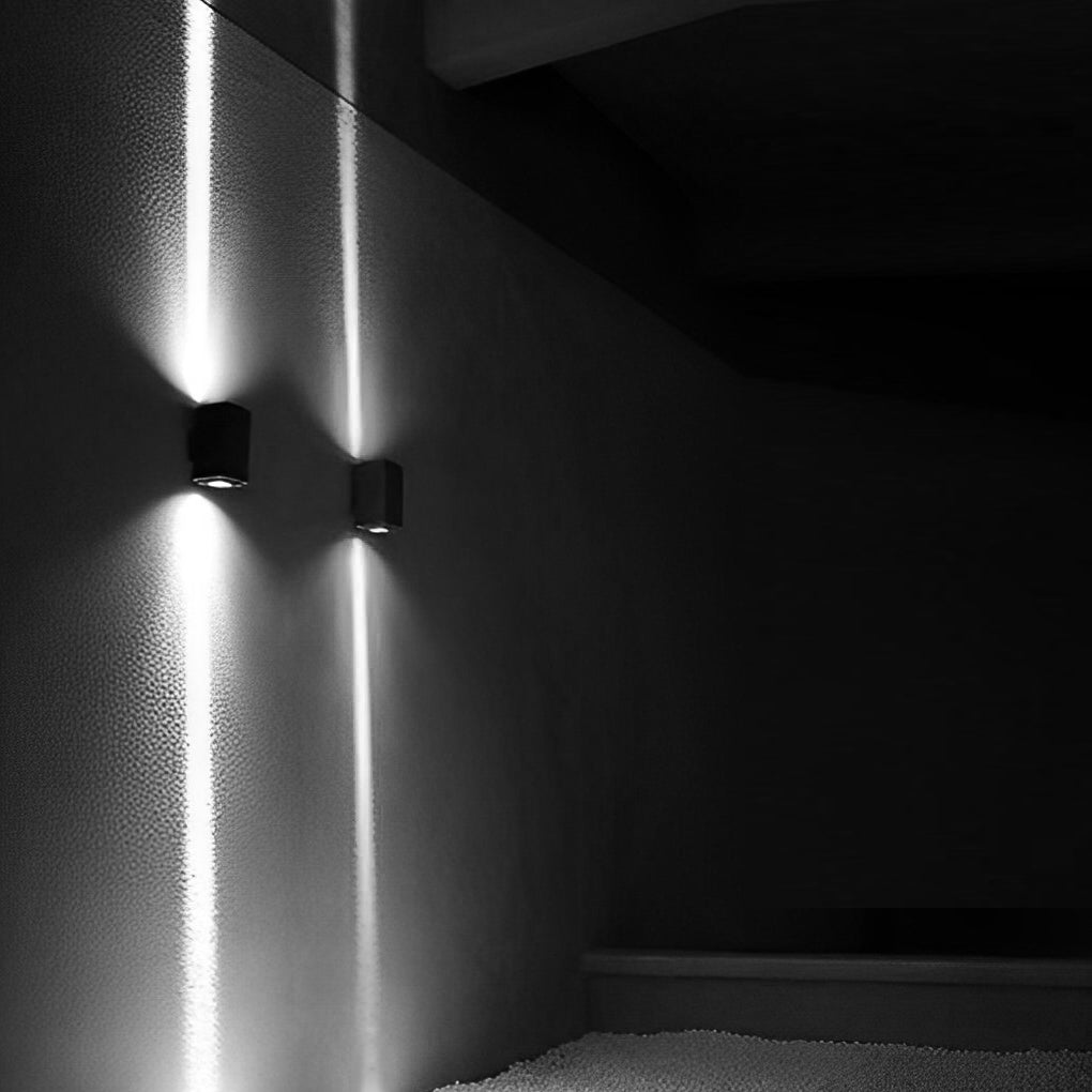 Sleek Black LED Up-Down Wall Sconce for Outdoor Building Illumination