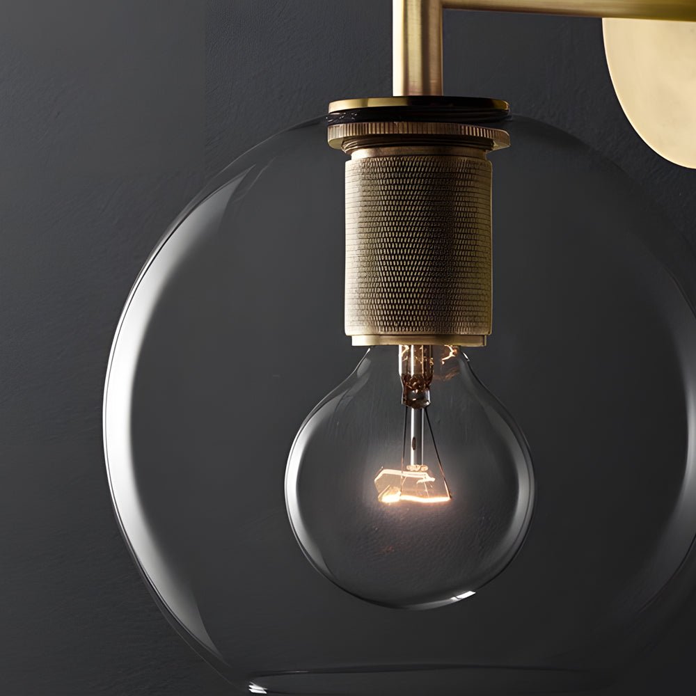 Minimalist Clear Glass Wall Lamp with Creative Hardware for Modern Spaces