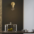 Minimalist Clear Glass Wall Lamp with Creative Hardware for Modern Spaces